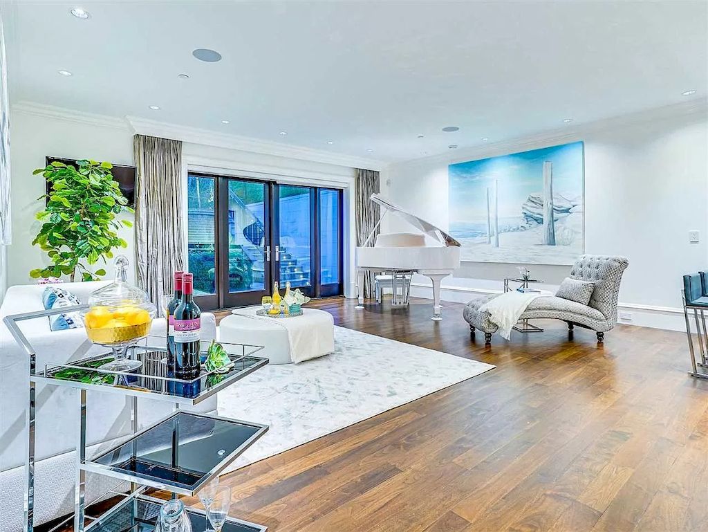 The Beautiful Cherry Blossoms House in Vancouver is a meticulously custom-built home now available for sale. This home is located at 1626 Avondale Ave, Vancouver, BC V6M 1S1, Canada