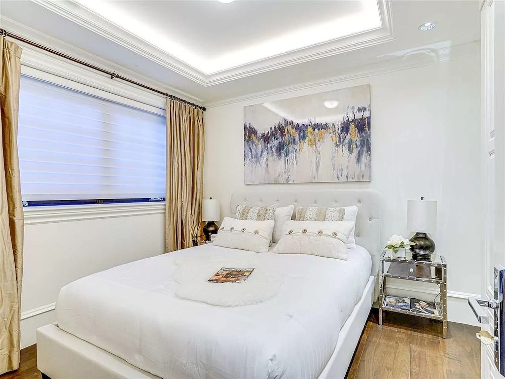 The Beautiful Cherry Blossoms House in Vancouver is a meticulously custom-built home now available for sale. This home is located at 1626 Avondale Ave, Vancouver, BC V6M 1S1, Canada
