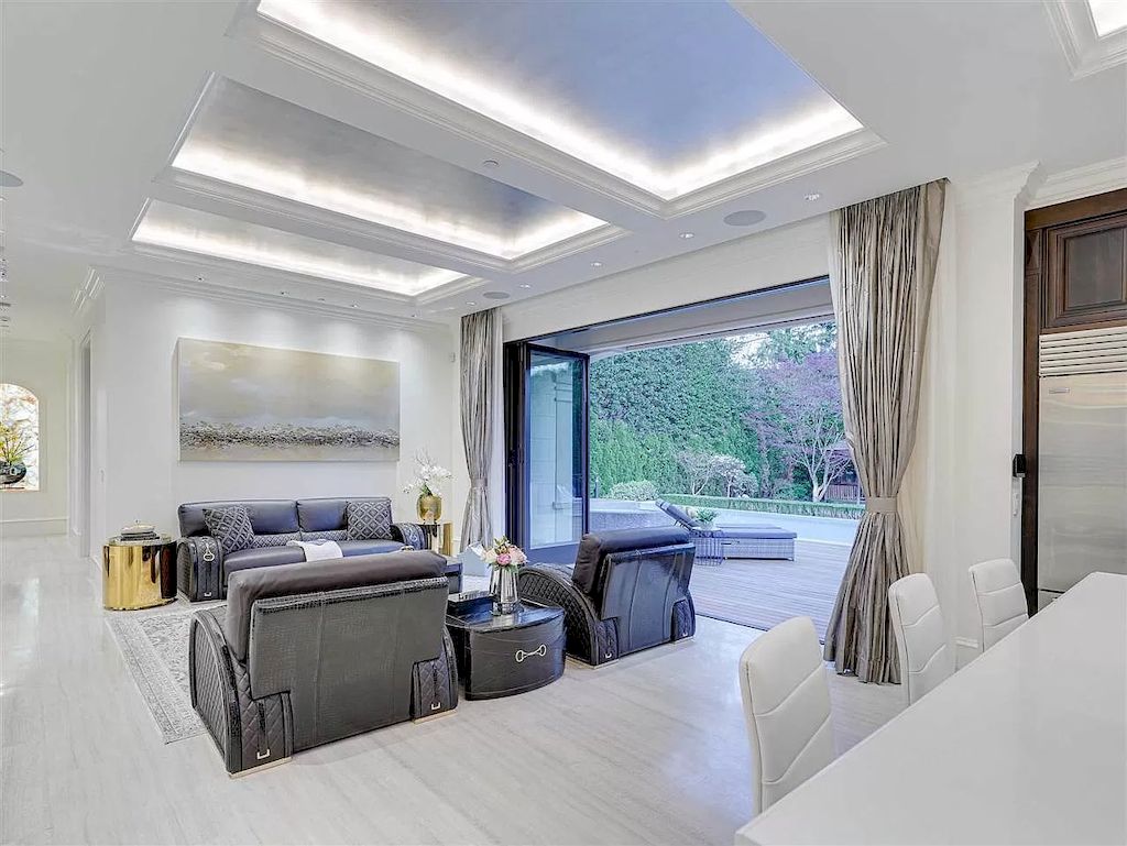 The Beautiful Cherry Blossoms House in Vancouver is a meticulously custom-built home now available for sale. This home is located at 1626 Avondale Ave, Vancouver, BC V6M 1S1, Canada
