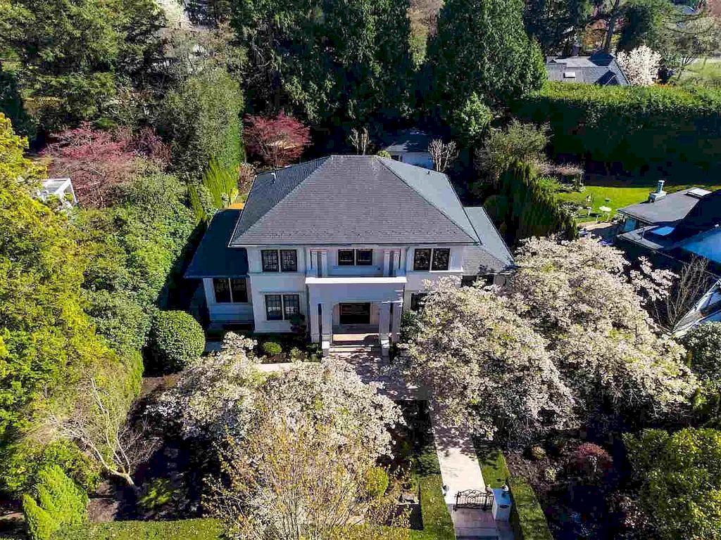 The Beautiful Cherry Blossoms House in Vancouver is a meticulously custom-built home now available for sale. This home is located at 1626 Avondale Ave, Vancouver, BC V6M 1S1, Canada