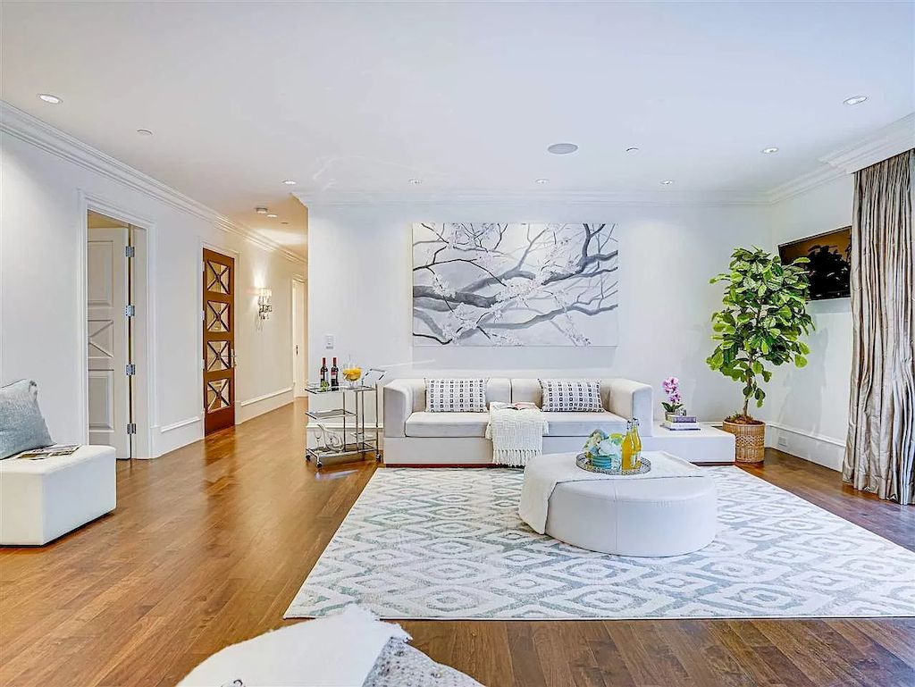The Beautiful Cherry Blossoms House in Vancouver is a meticulously custom-built home now available for sale. This home is located at 1626 Avondale Ave, Vancouver, BC V6M 1S1, Canada