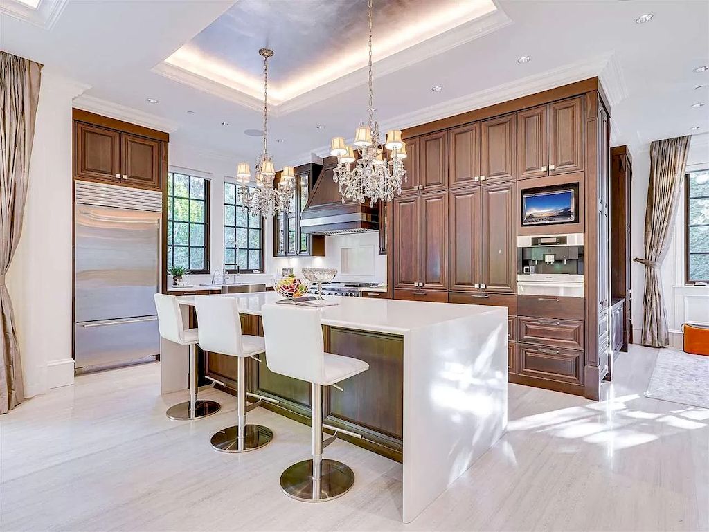 The Beautiful Cherry Blossoms House in Vancouver is a meticulously custom-built home now available for sale. This home is located at 1626 Avondale Ave, Vancouver, BC V6M 1S1, Canada