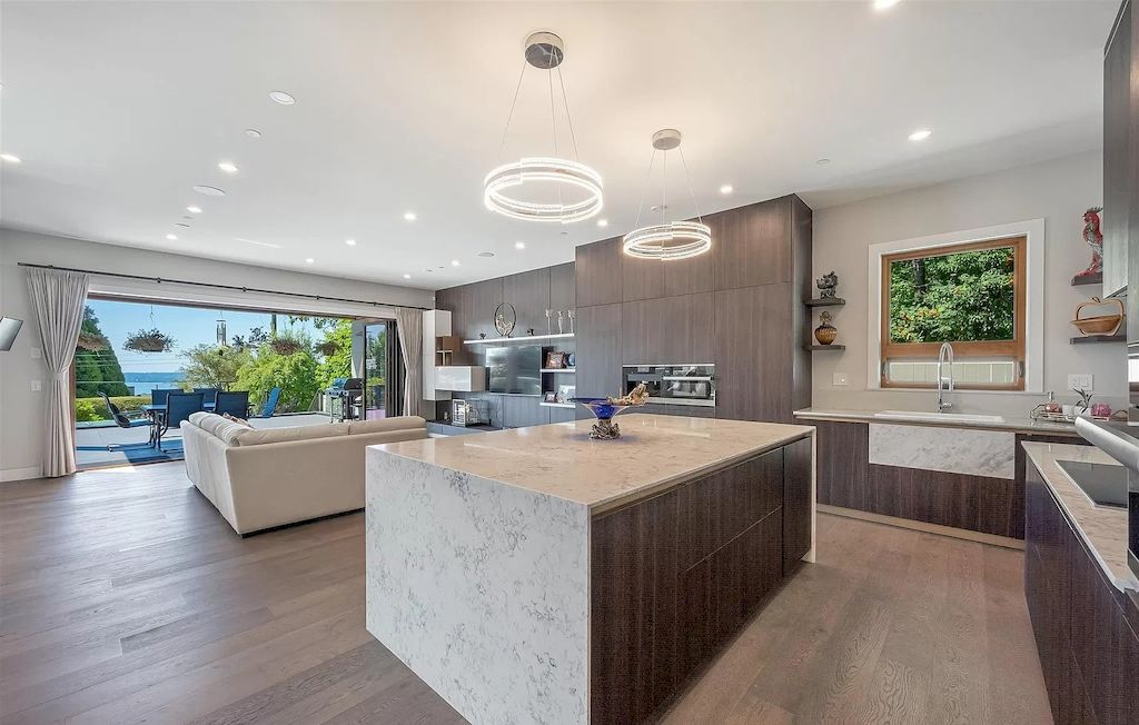 The Brilliantly Designed Contemporary Home in West Vancouver is an amazing home now available for sale. This home is located at 1497 Queens Ave, West Vancouver, BC V7T 2J1, Canada