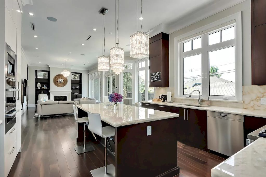 The Shaughnessy Estate is a traditional yet contemporary home now available for sale. This home is located at 4237 Angus Dr, Vancouver, BC V6J 4J1, Canada