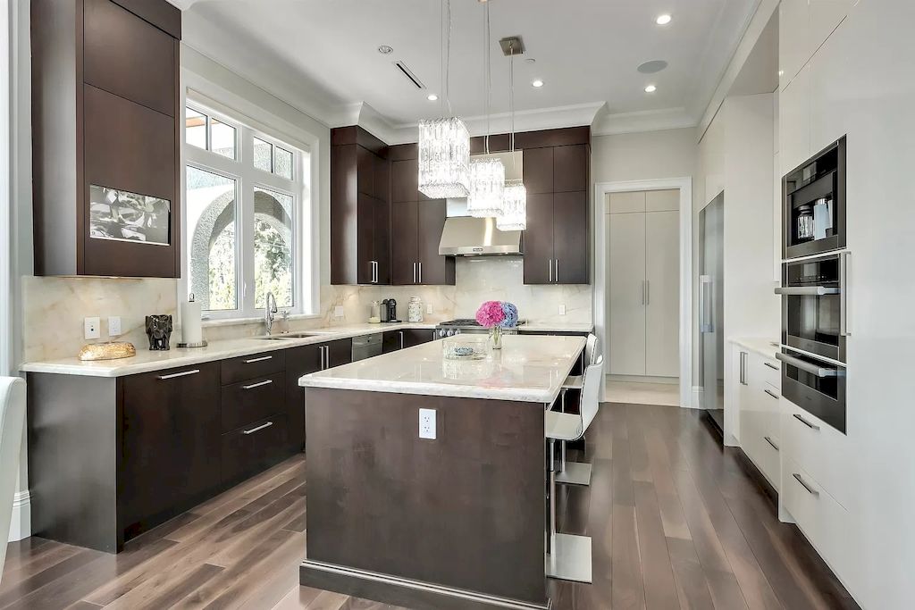 The Shaughnessy Estate is a traditional yet contemporary home now available for sale. This home is located at 4237 Angus Dr, Vancouver, BC V6J 4J1, Canada
