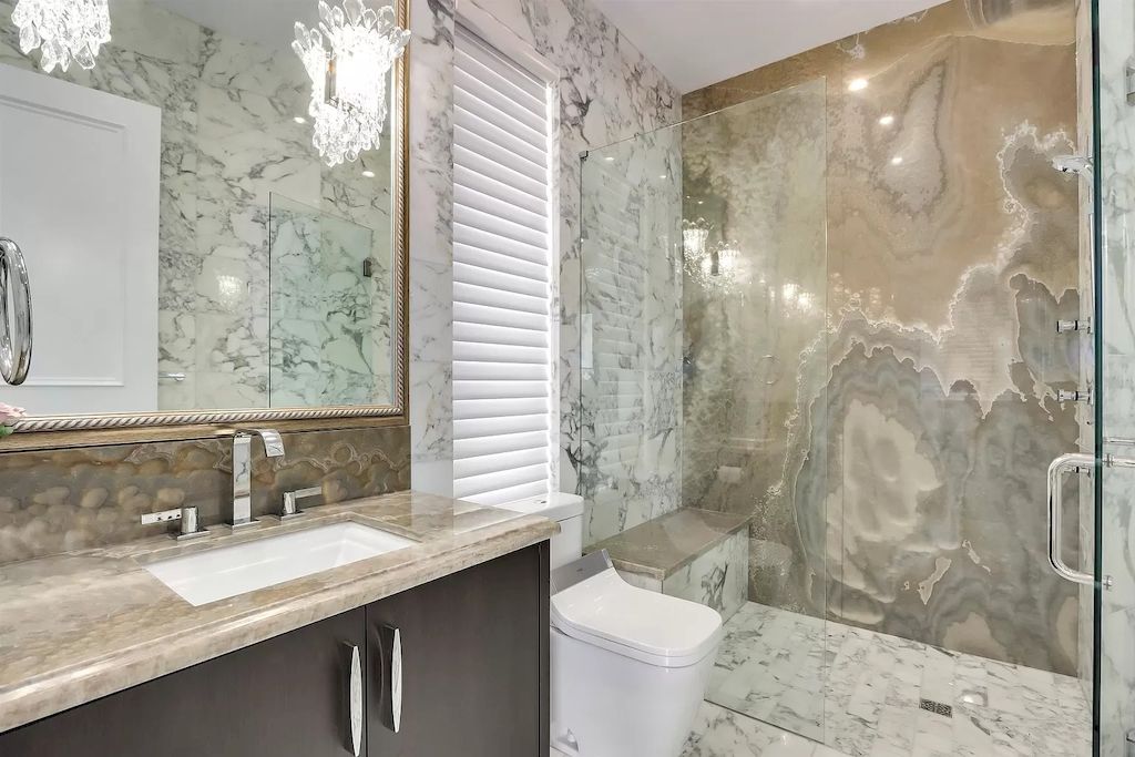 The Shaughnessy Estate is a traditional yet contemporary home now available for sale. This home is located at 4237 Angus Dr, Vancouver, BC V6J 4J1, Canada