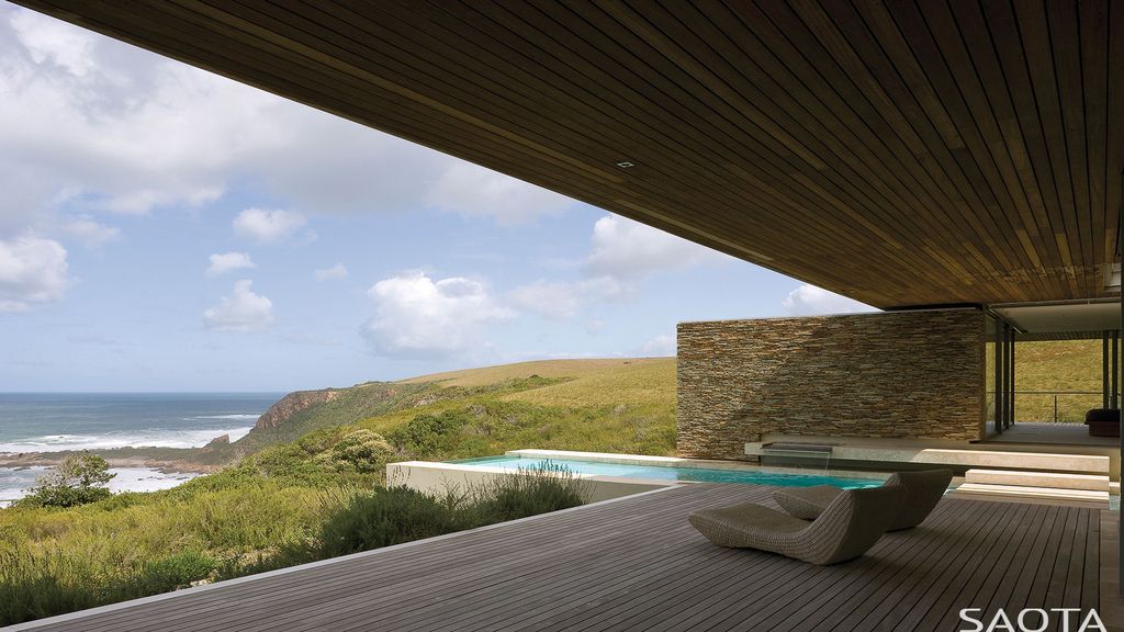 Cove 6 Offers Spectacular Views of Sea and Rocky Landscape by SAOTA 4