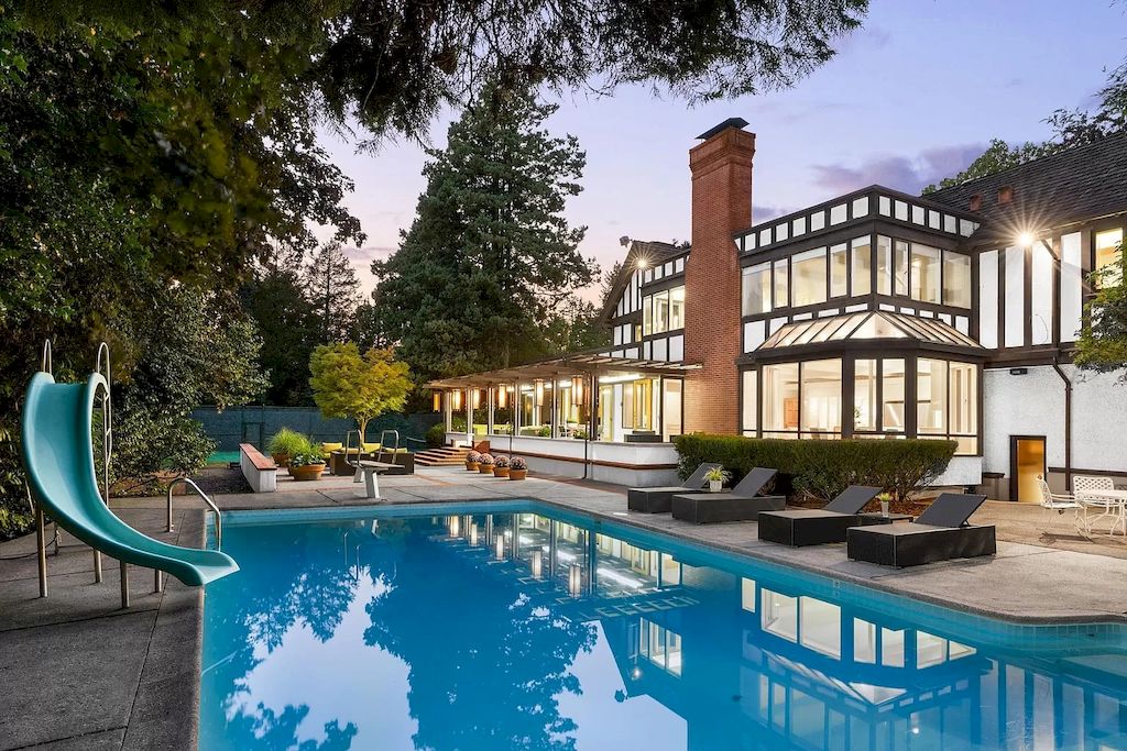 The Elegant Tudor Mansion in Vancouver is a magnificent property now available for sale. This home is located at 1250 W 54th Ave, Vancouver, BC V6P 1N1, Canada