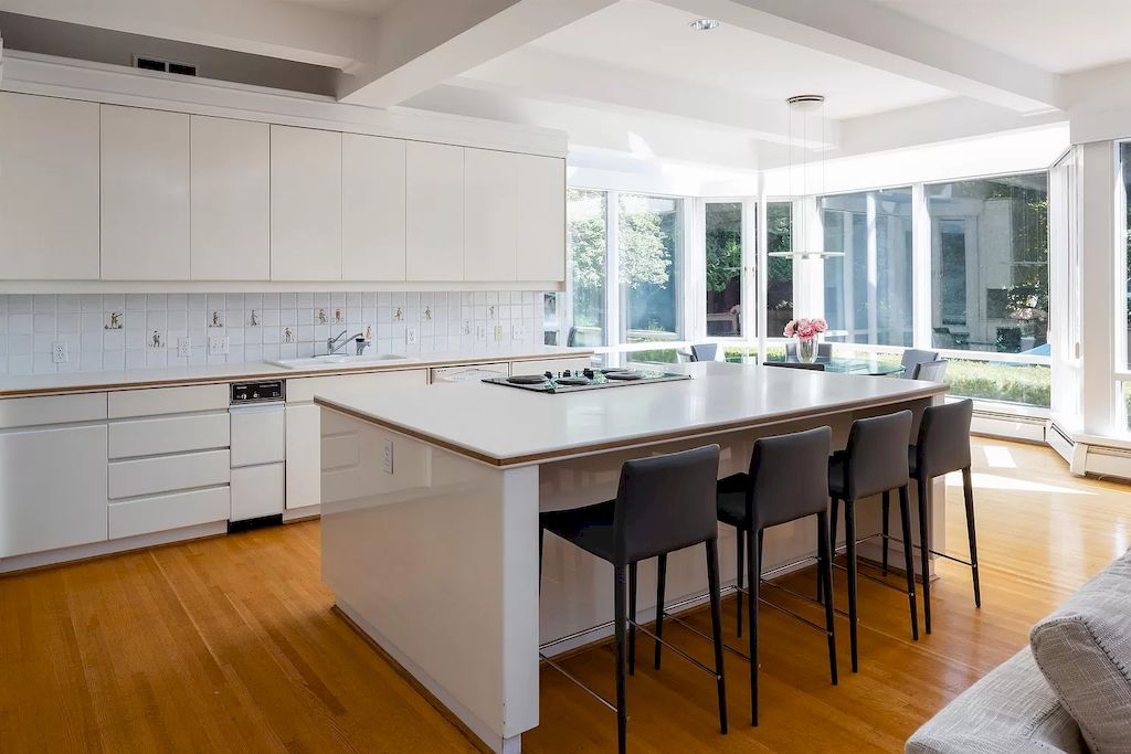 The Elegant Tudor Mansion in Vancouver is a magnificent property now available for sale. This home is located at 1250 W 54th Ave, Vancouver, BC V6P 1N1, Canada