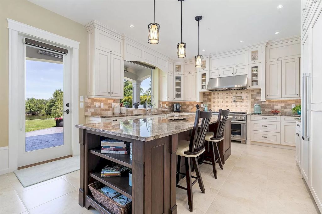 The European Country Style Home in Langley is a lakefront property with spectacular mountain views now available for sale. This home is located at 20067 1st Ave, Langley, BC V2Z 0A4, Canada