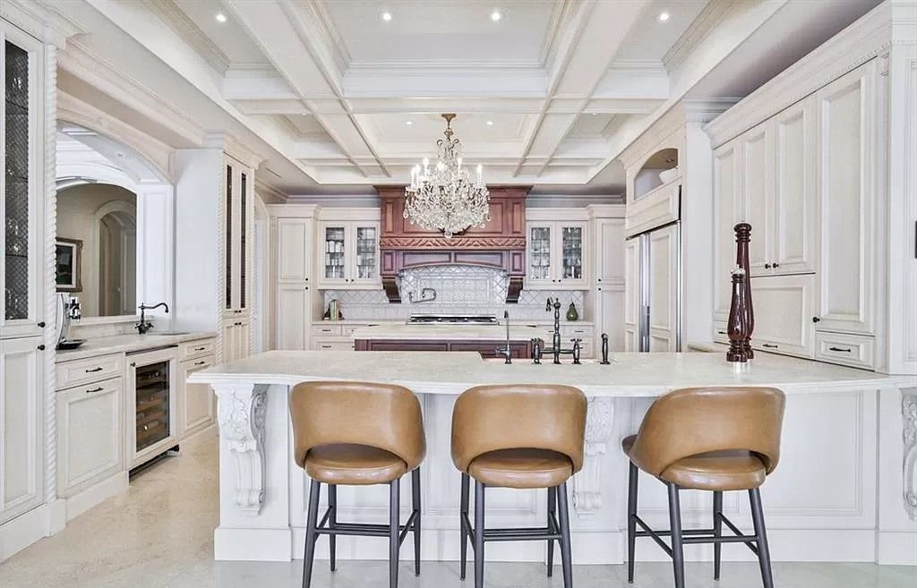 The Incredible Parisian Chateau in Ontario is a waterfront home now available for sale. This home is located at 2064 Lakeshore Rd E, Oakville, ON L6J 1M3, Canada