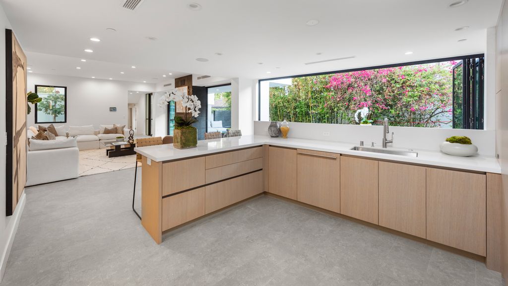 The Home in Santa Monica is a magnificent contemporary style estate with perfect blend of modern architecture, design, and technology now available for sale. This home located at 218 Alta Ave, Santa Monica, California