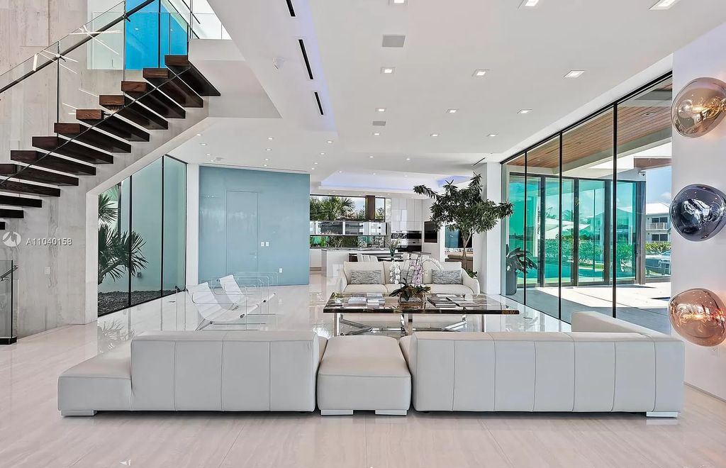 The Home in Miami is a brand new luxury modern estate with stunning bay views and over 100 feet of linear waterfront now available for sale. This home located at 1133 Belle Meade Island Dr, Miami, Florida
