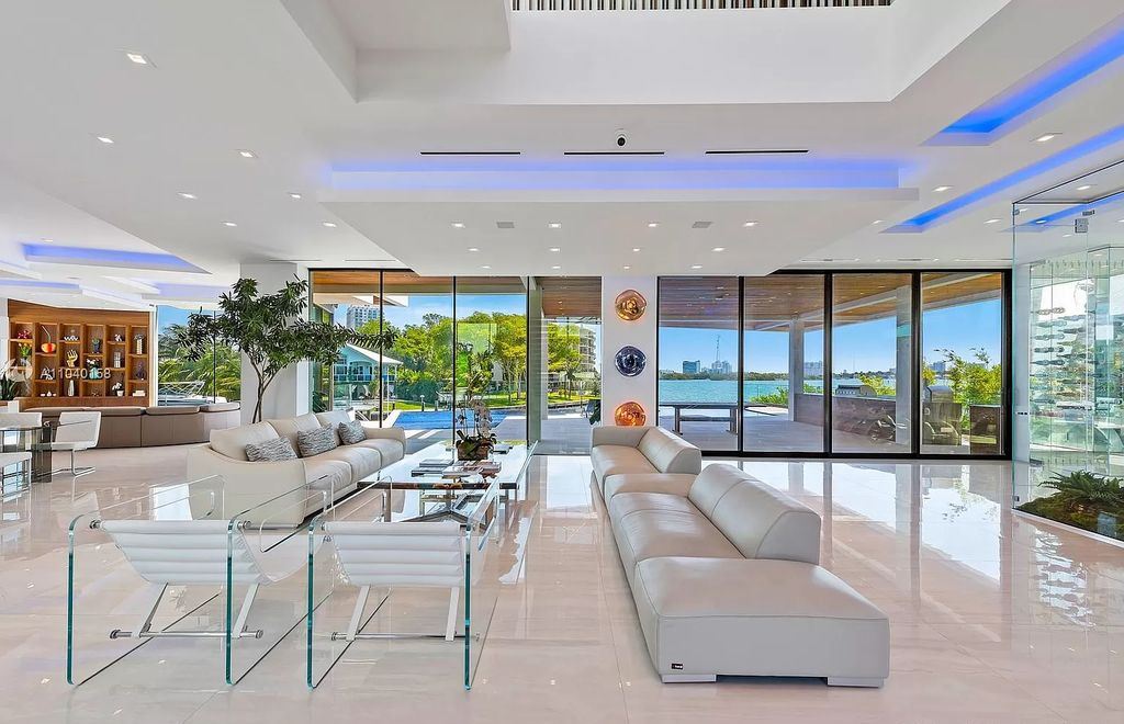The Home in Miami is a brand new luxury modern estate with stunning bay views and over 100 feet of linear waterfront now available for sale. This home located at 1133 Belle Meade Island Dr, Miami, Florida
