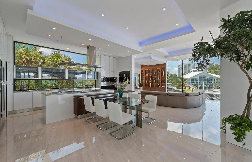 The Home in Miami is a brand new luxury modern estate with stunning bay views and over 100 feet of linear waterfront now available for sale. This home located at 1133 Belle Meade Island Dr, Miami, Florida