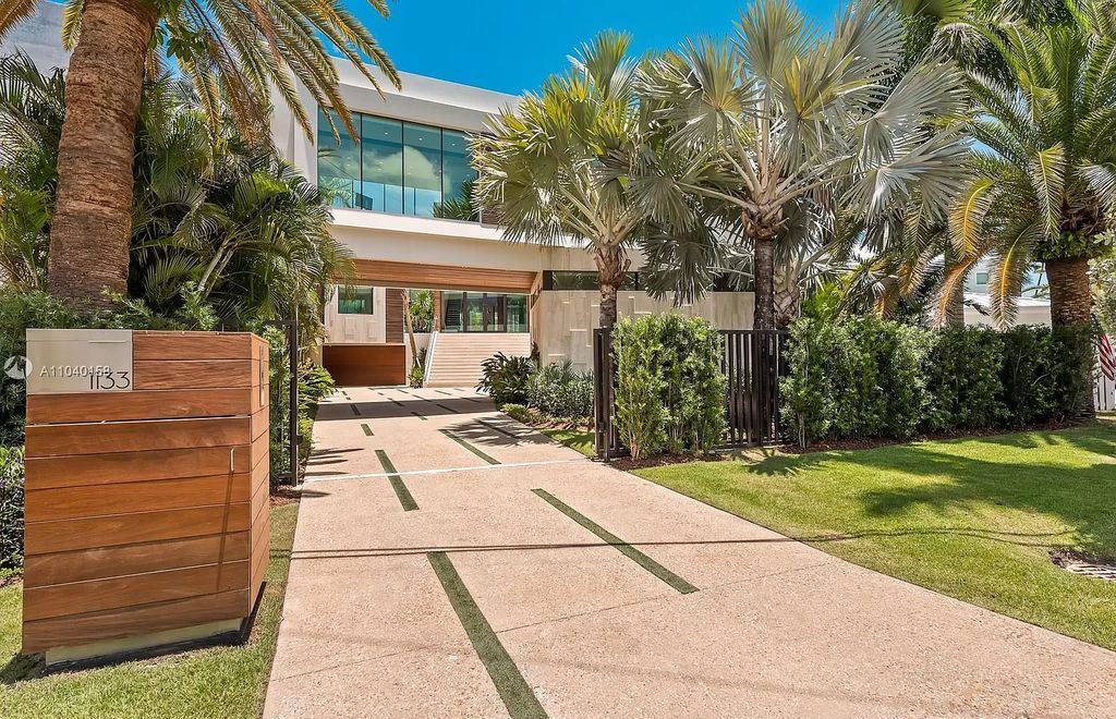 The Home in Miami is a brand new luxury modern estate with stunning bay views and over 100 feet of linear waterfront now available for sale. This home located at 1133 Belle Meade Island Dr, Miami, Florida