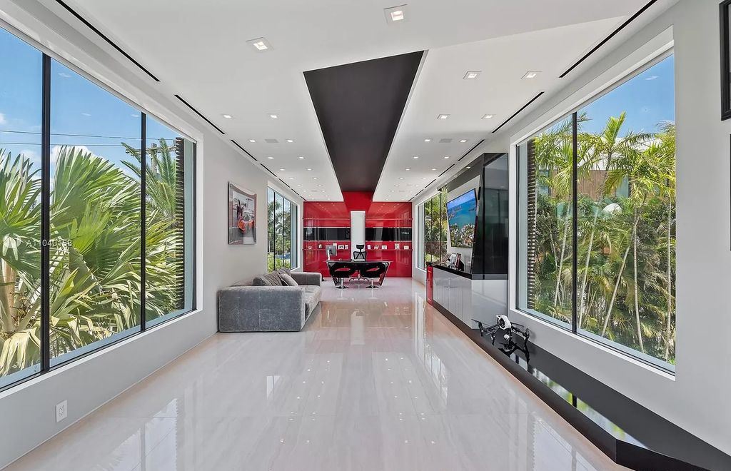 The Home in Miami is a brand new luxury modern estate with stunning bay views and over 100 feet of linear waterfront now available for sale. This home located at 1133 Belle Meade Island Dr, Miami, Florida