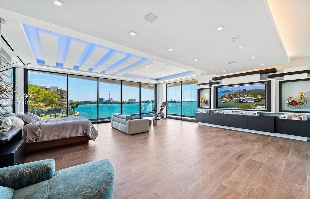 The Home in Miami is a brand new luxury modern estate with stunning bay views and over 100 feet of linear waterfront now available for sale. This home located at 1133 Belle Meade Island Dr, Miami, Florida