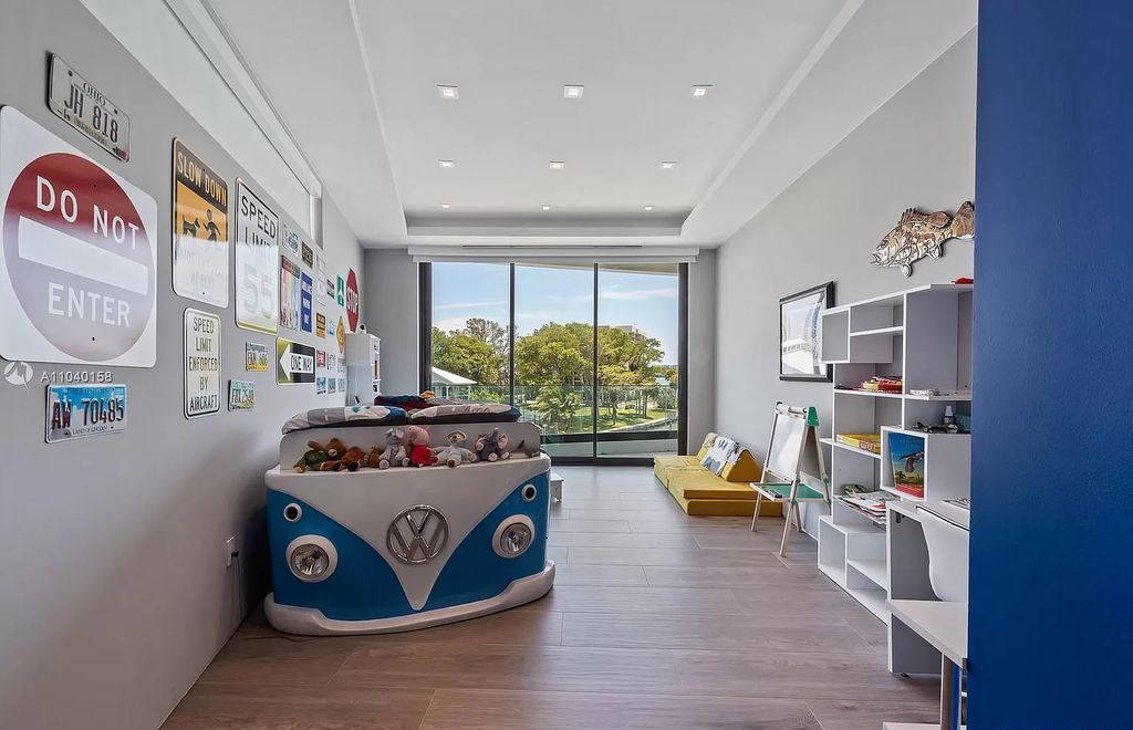 The Home in Miami is a brand new luxury modern estate with stunning bay views and over 100 feet of linear waterfront now available for sale. This home located at 1133 Belle Meade Island Dr, Miami, Florida