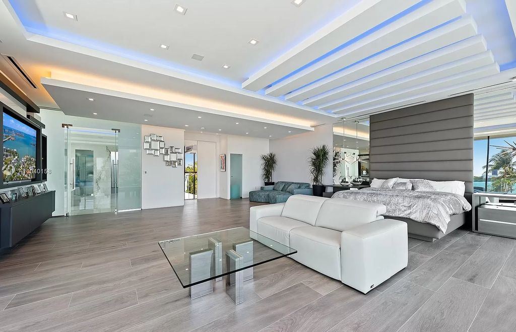 The Home in Miami is a brand new luxury modern estate with stunning bay views and over 100 feet of linear waterfront now available for sale. This home located at 1133 Belle Meade Island Dr, Miami, Florida