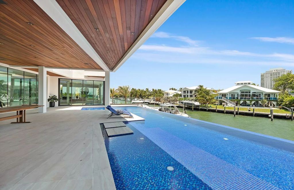 The Home in Miami is a brand new luxury modern estate with stunning bay views and over 100 feet of linear waterfront now available for sale. This home located at 1133 Belle Meade Island Dr, Miami, Florida