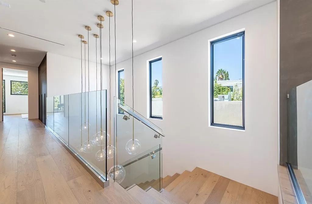 The Los Angeles Home is a new construction in the heart of Beverly Grove, designed and built by Arzuman Brothers now available for sale. This home located at 812 N La Jolla Ave, Los Angeles, California