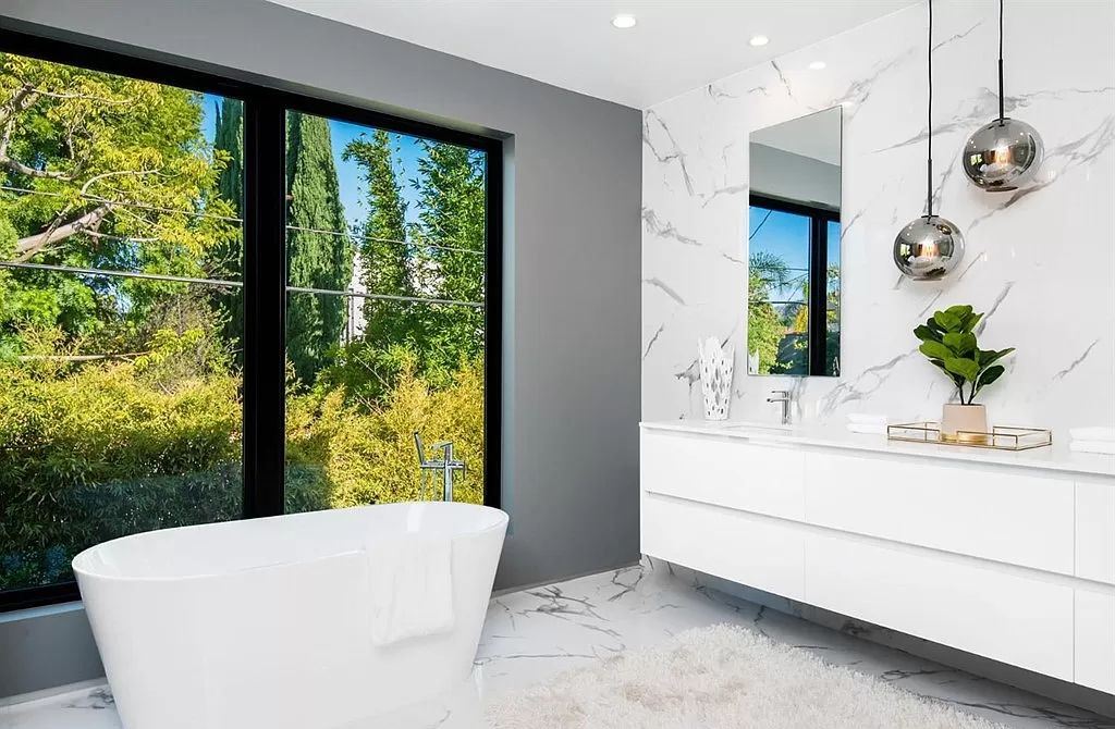 The Los Angeles Home is a new construction in the heart of Beverly Grove, designed and built by Arzuman Brothers now available for sale. This home located at 812 N La Jolla Ave, Los Angeles, California