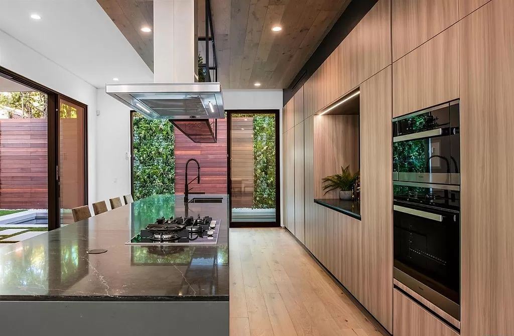 The Los Angeles Home is a new construction in the heart of Beverly Grove, designed and built by Arzuman Brothers now available for sale. This home located at 812 N La Jolla Ave, Los Angeles, California
