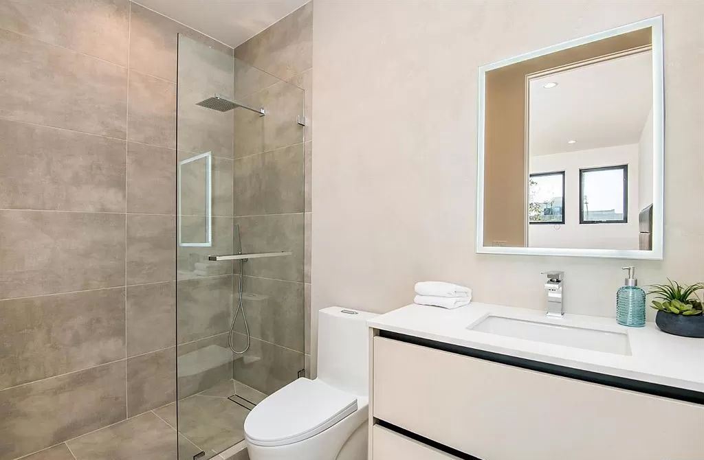 The Los Angeles Home is a new construction in the heart of Beverly Grove, designed and built by Arzuman Brothers now available for sale. This home located at 812 N La Jolla Ave, Los Angeles, California