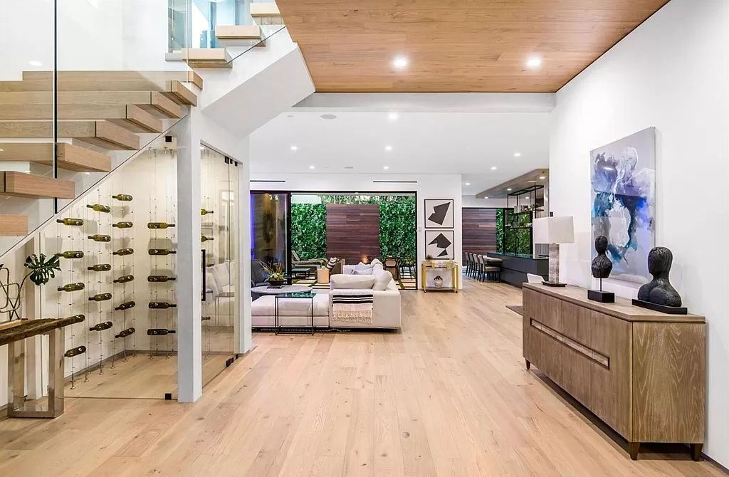 The Los Angeles Home is a new construction in the heart of Beverly Grove, designed and built by Arzuman Brothers now available for sale. This home located at 812 N La Jolla Ave, Los Angeles, California