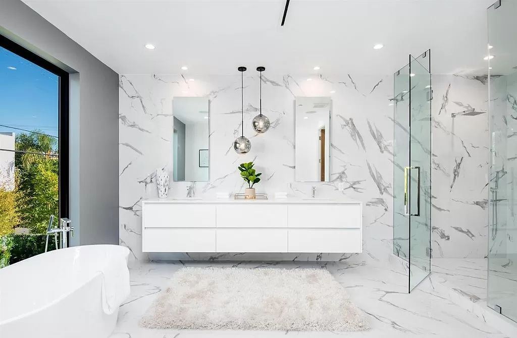The Los Angeles Home is a new construction in the heart of Beverly Grove, designed and built by Arzuman Brothers now available for sale. This home located at 812 N La Jolla Ave, Los Angeles, California
