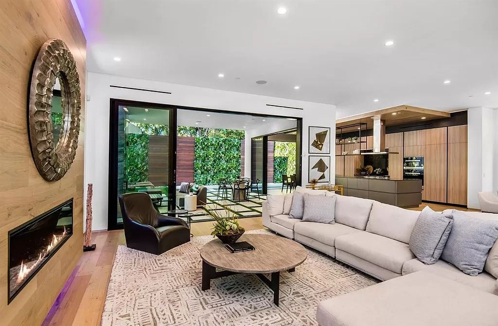 The Los Angeles Home is a new construction in the heart of Beverly Grove, designed and built by Arzuman Brothers now available for sale. This home located at 812 N La Jolla Ave, Los Angeles, California