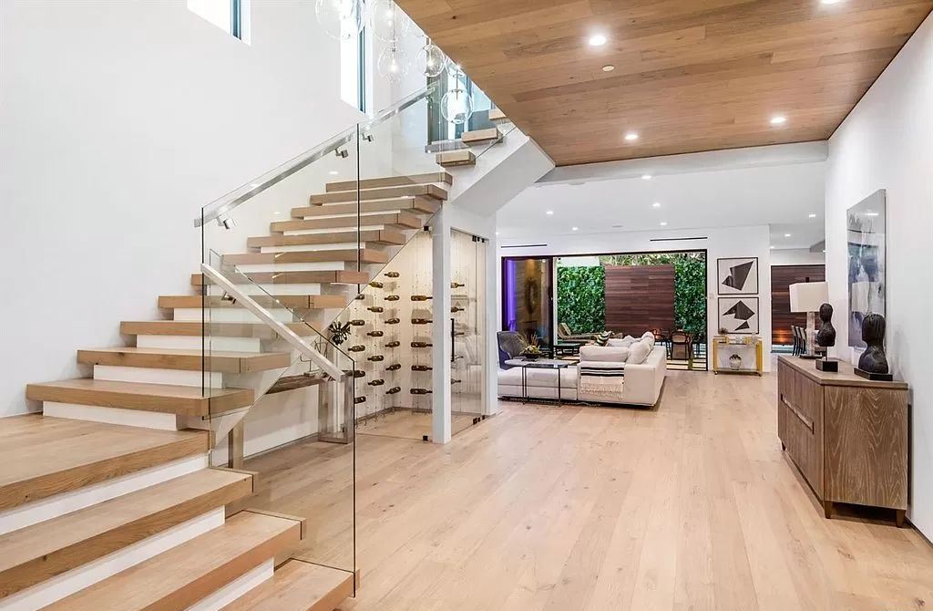 The Los Angeles Home is a new construction in the heart of Beverly Grove, designed and built by Arzuman Brothers now available for sale. This home located at 812 N La Jolla Ave, Los Angeles, California