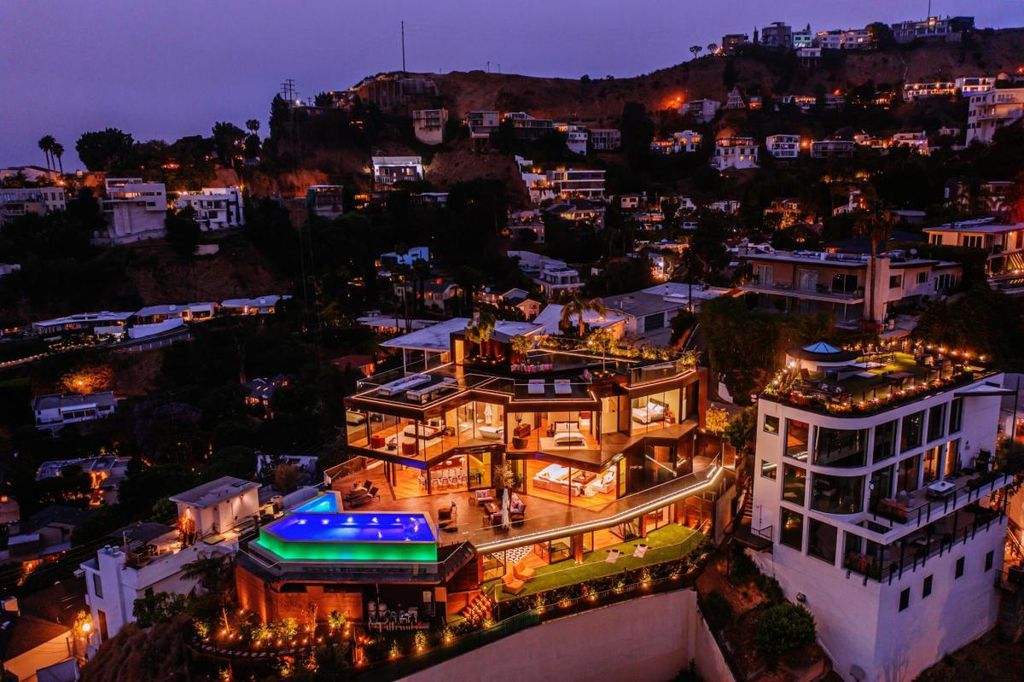 The Hollywood Hills Home is a brand new luxurious property offers a unique architectural, visual and lifestyle experience now available for sale. This home located at 8542 Hollywood Blvd, Los Angeles, California