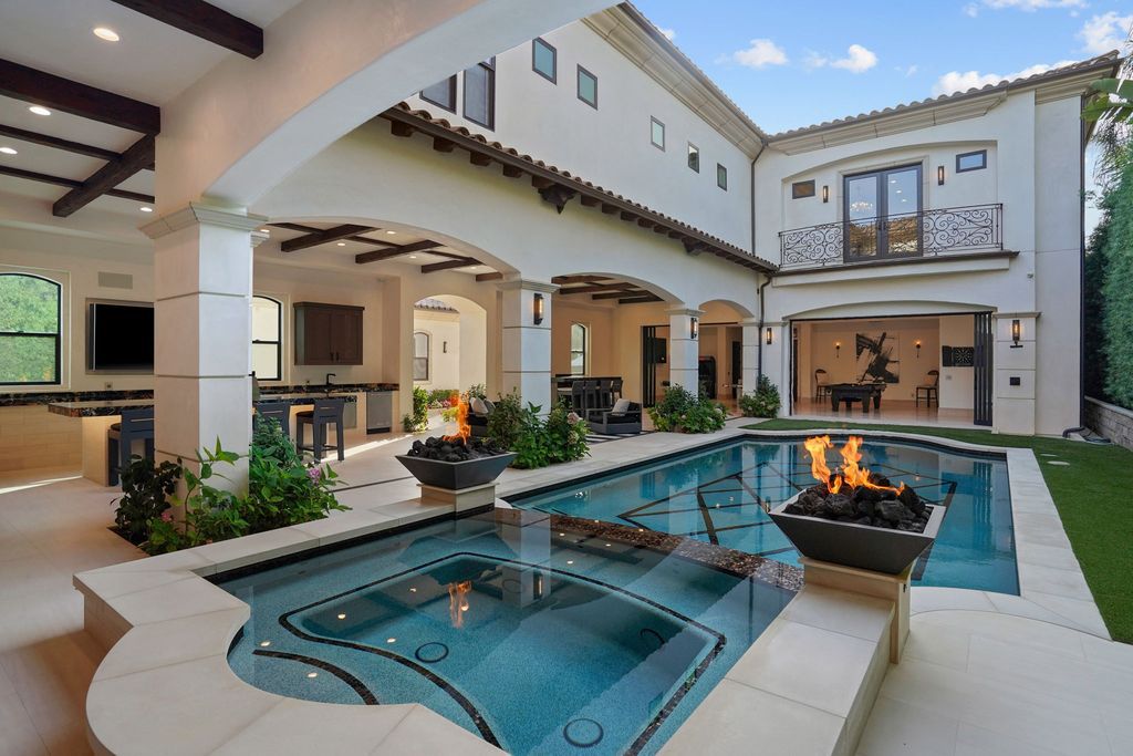 The Newport Beach Home is a compound-like residence boasts impeccable design in the Upper Back Bay with premium finishes throughout now available for sale. This home located at 20101 SW Cypress St, Newport Beach, California