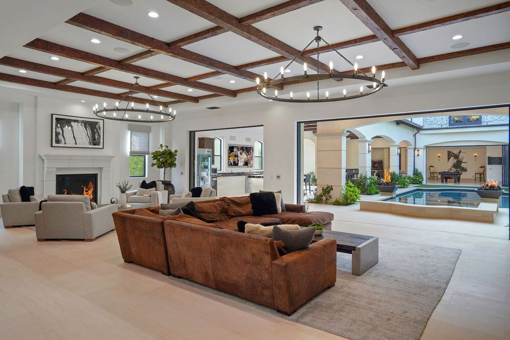 The Newport Beach Home is a compound-like residence boasts impeccable design in the Upper Back Bay with premium finishes throughout now available for sale. This home located at 20101 SW Cypress St, Newport Beach, California