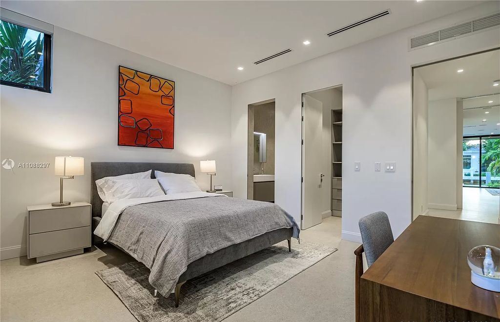 The Miami Home is a stunning brand new modern estate with enormous impact windows and doors offering an abundance of natural light now available for sale. This home located at 7362 SW 104th St, Miami, Florida