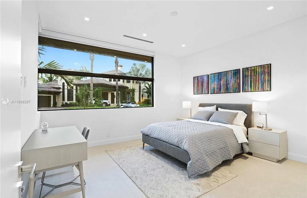 The Miami Home is a stunning brand new modern estate with enormous impact windows and doors offering an abundance of natural light now available for sale. This home located at 7362 SW 104th St, Miami, Florida