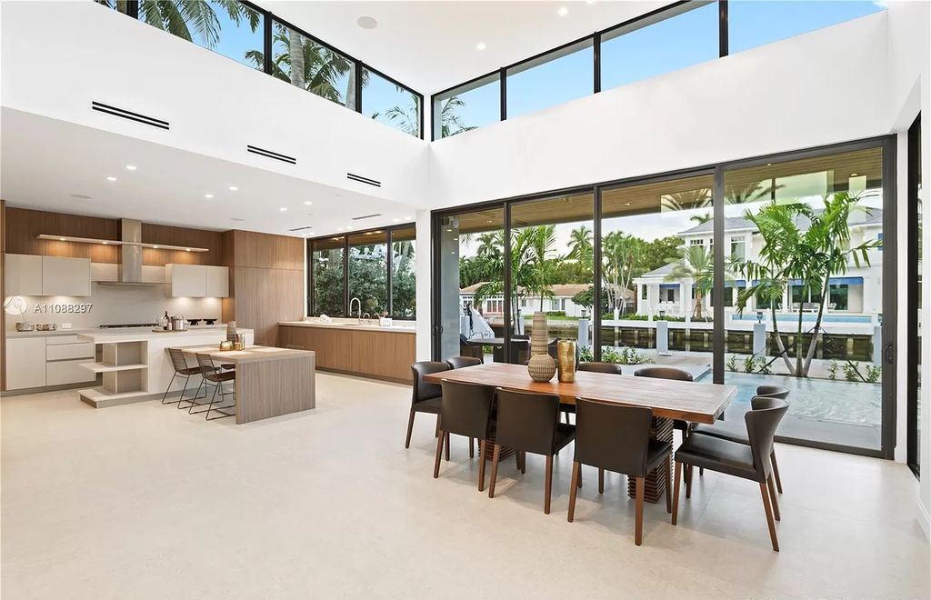 The Miami Home is a stunning brand new modern estate with enormous impact windows and doors offering an abundance of natural light now available for sale. This home located at 7362 SW 104th St, Miami, Florida