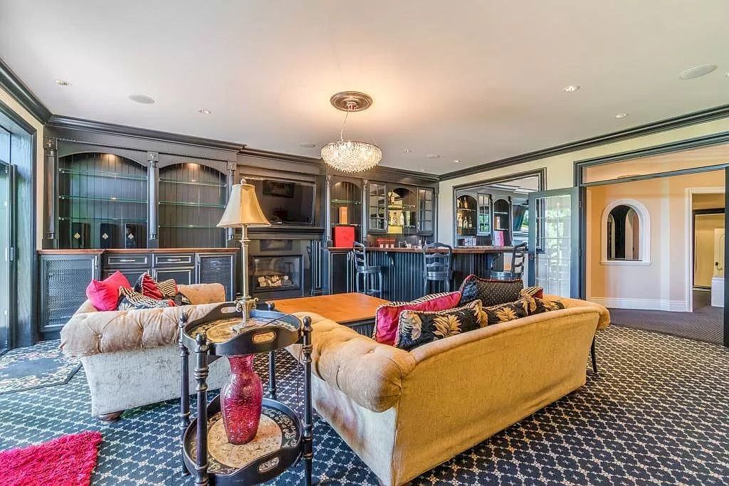 The Tuscan Style Home in Surrey is a high-quality custom-built waterfront house now available for sale. This home is located at 13011 Crescent Rd, Surrey, BC V4P 1J6, Canada