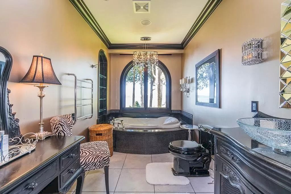 The Tuscan Style Home in Surrey is a high-quality custom-built waterfront house now available for sale. This home is located at 13011 Crescent Rd, Surrey, BC V4P 1J6, Canada