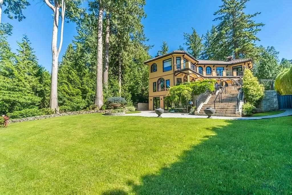 The Tuscan Style Home in Surrey is a high-quality custom-built waterfront house now available for sale. This home is located at 13011 Crescent Rd, Surrey, BC V4P 1J6, Canada