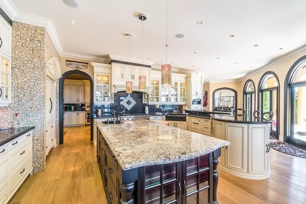 The Tuscan Style Home in Surrey is a high-quality custom-built waterfront house now available for sale. This home is located at 13011 Crescent Rd, Surrey, BC V4P 1J6, Canada