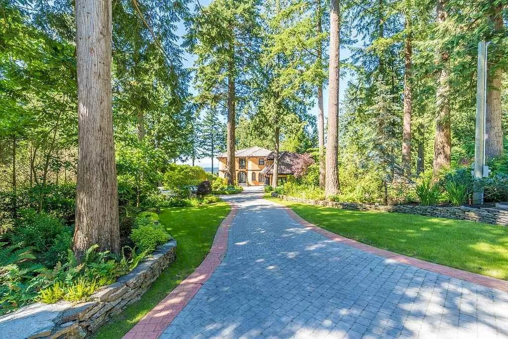 The Tuscan Style Home in Surrey is a high-quality custom-built waterfront house now available for sale. This home is located at 13011 Crescent Rd, Surrey, BC V4P 1J6, Canada