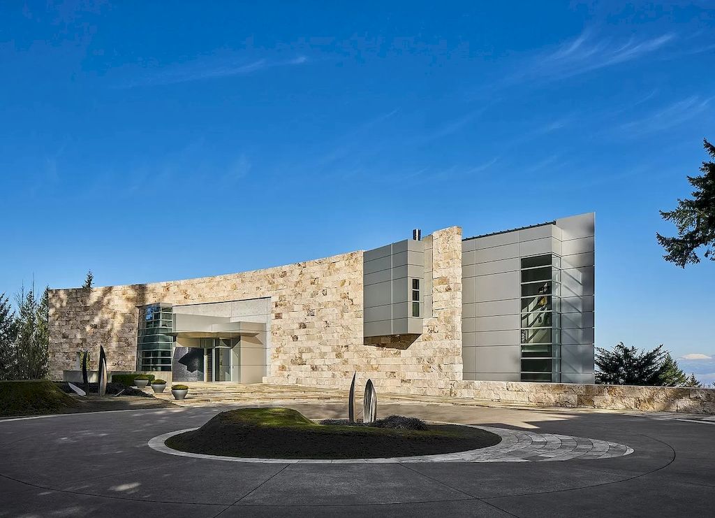 The Architecturally Significant Contemporary House in Oregon offers the perfect balance between function & form now available for sale. This home is located at 9912 NW Wind Ridge Dr, Portland, Oregon