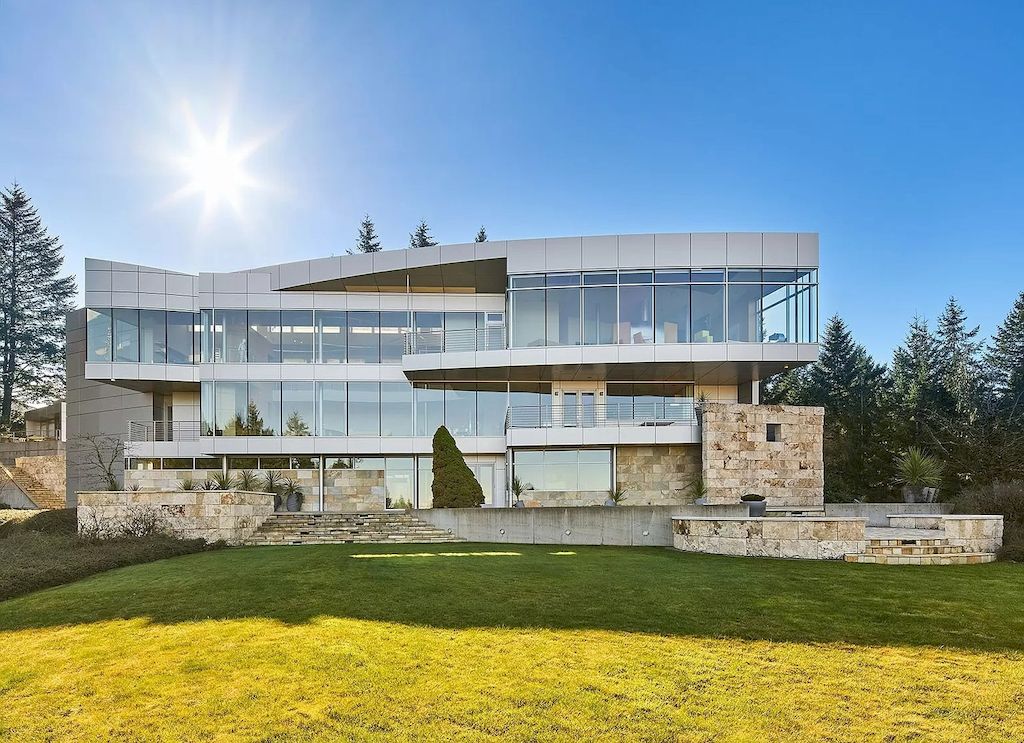 The Architecturally Significant Contemporary House in Oregon offers the perfect balance between function & form now available for sale. This home is located at 9912 NW Wind Ridge Dr, Portland, Oregon