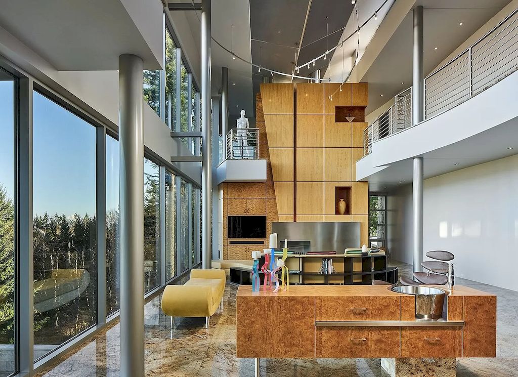 The Architecturally Significant Contemporary House in Oregon offers the perfect balance between function & form now available for sale. This home is located at 9912 NW Wind Ridge Dr, Portland, Oregon
