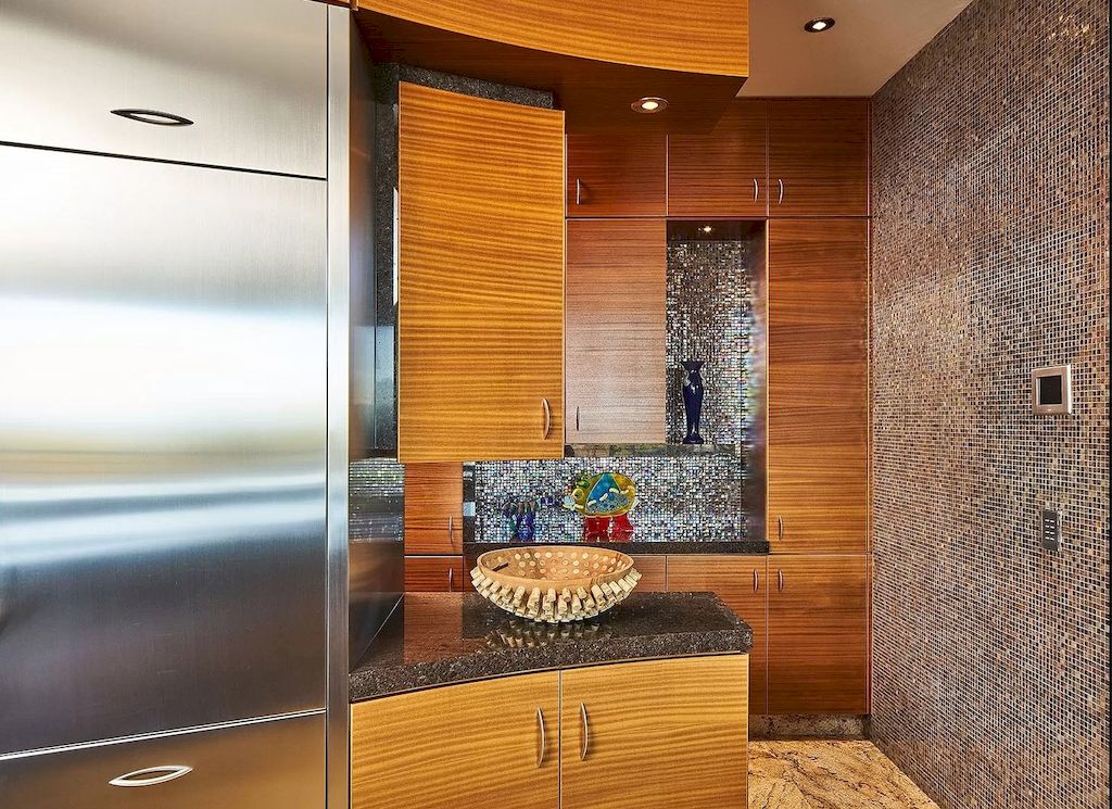 The Architecturally Significant Contemporary House in Oregon offers the perfect balance between function & form now available for sale. This home is located at 9912 NW Wind Ridge Dr, Portland, Oregon