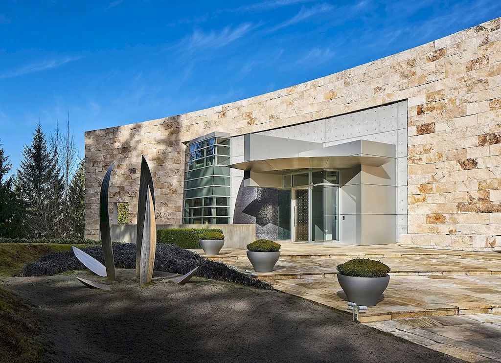 The Architecturally Significant Contemporary House in Oregon offers the perfect balance between function & form now available for sale. This home is located at 9912 NW Wind Ridge Dr, Portland, Oregon