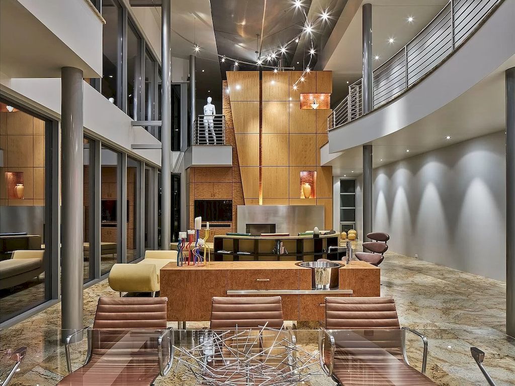 The Architecturally Significant Contemporary House in Oregon offers the perfect balance between function & form now available for sale. This home is located at 9912 NW Wind Ridge Dr, Portland, Oregon